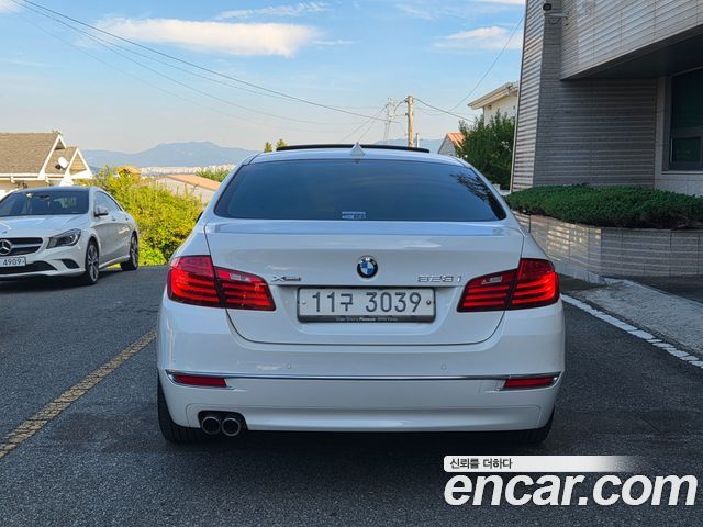 BMW 5-Series 2015 — photo 18