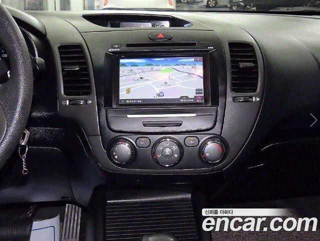 Kia K3 2013 — photo 10