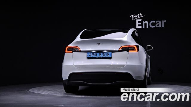 Tesla Model Y 2024 — photo 4
