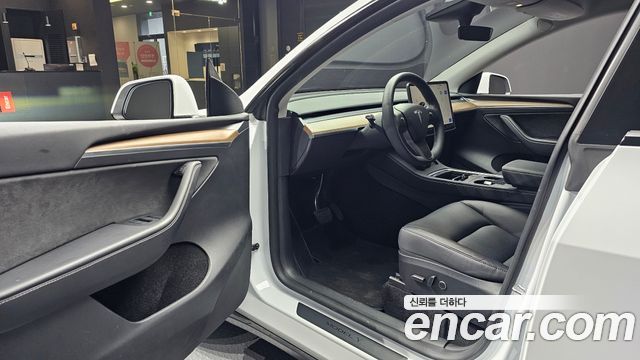 Tesla Model Y 2024 — photo 10