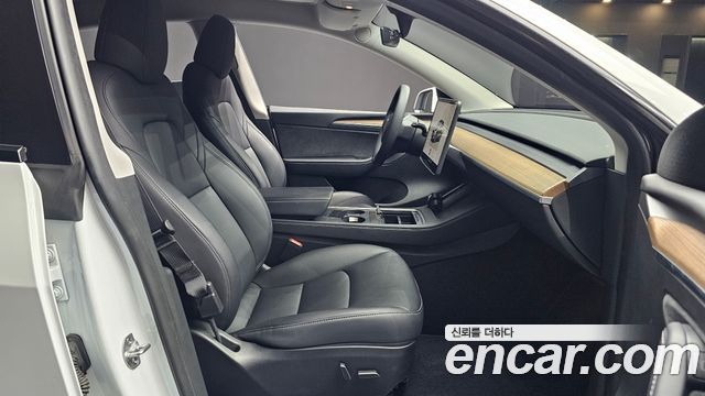 Tesla Model Y 2024 — photo 11