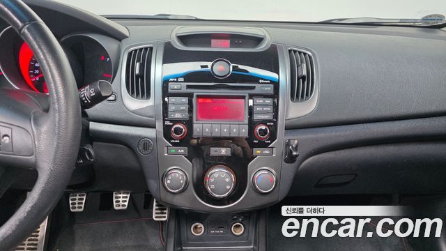 Kia Porte 2010 — photo 14