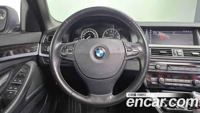 BMW 5-Series 2012 — photo 13