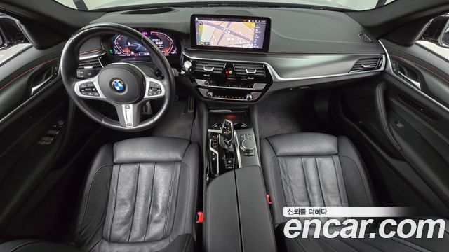 BMW 5-Series 2023 — photo 10