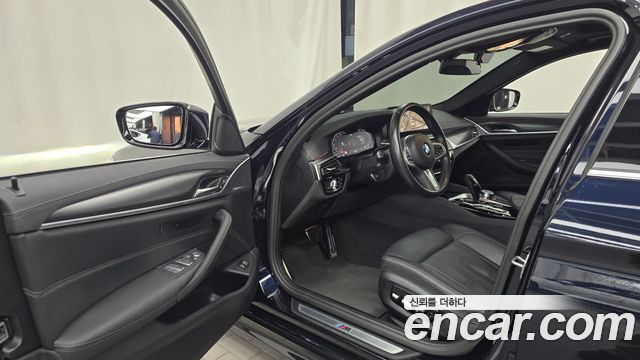 BMW 5-Series 2023 — photo 13
