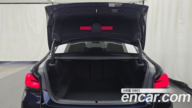 BMW 5-Series 2023 — photo 24