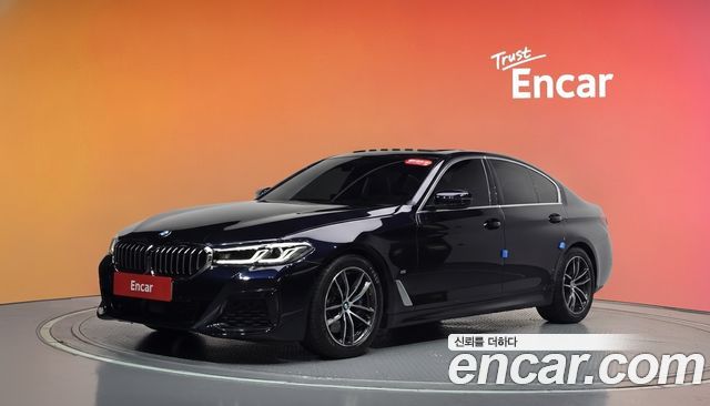 BMW 5-Series 2023 — photo 1