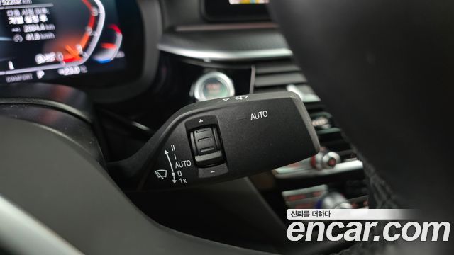 BMW 5-Series 2023 — photo 28