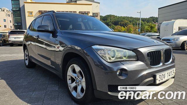 BMW X1 2014 — photo 1