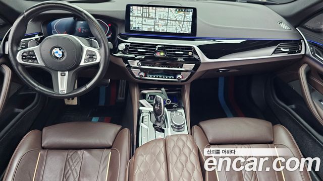 BMW 5-Series 2023 — photo 10