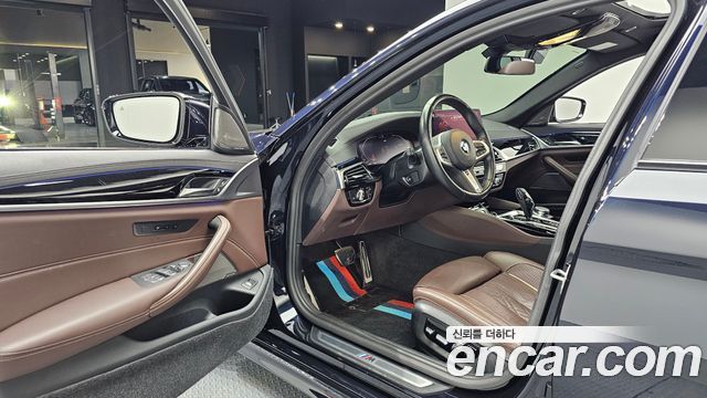 BMW 5-Series 2023 — photo 13
