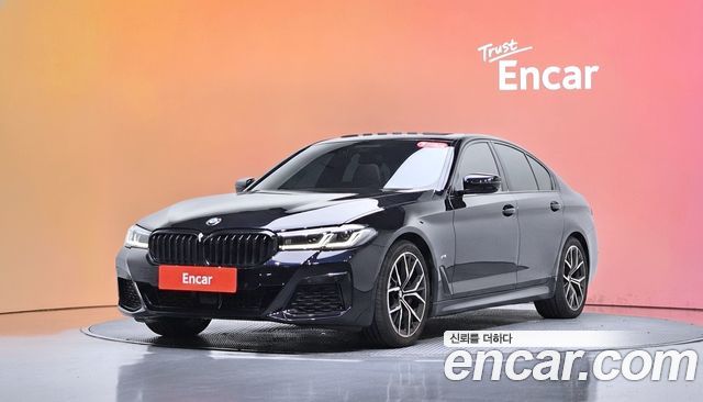 BMW 5-Series 2023 — photo 1