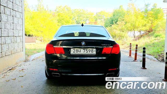 BMW 7-Series 2011 — photo 4