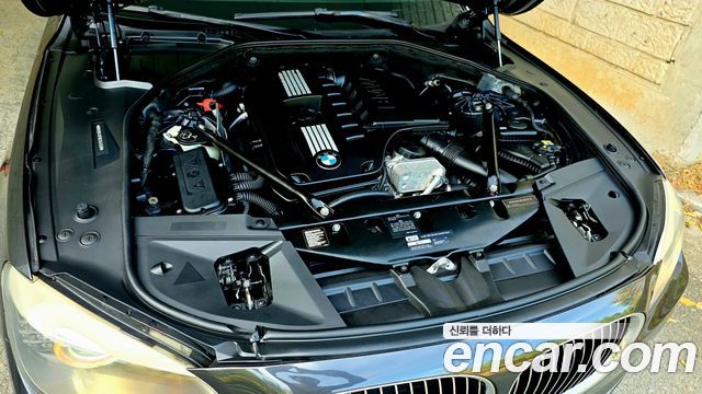 BMW 7-Series 2011 — photo 6