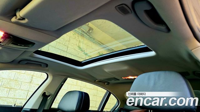 BMW 7-Series 2011 — photo 15