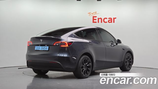 Tesla Model Y 2025 — photo 2