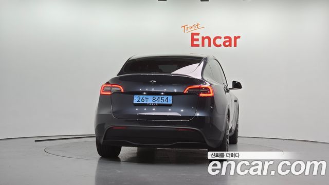 Tesla Model Y 2025 — photo 4