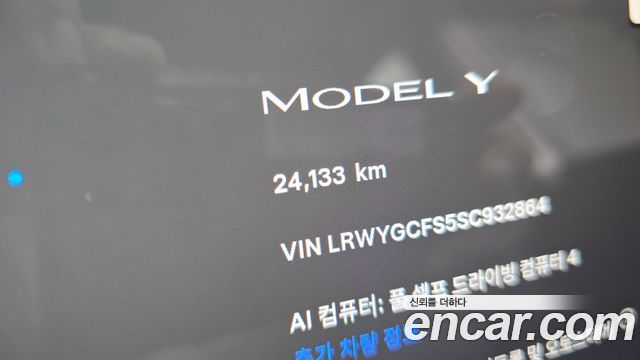 Tesla Model Y 2025 — photo 11