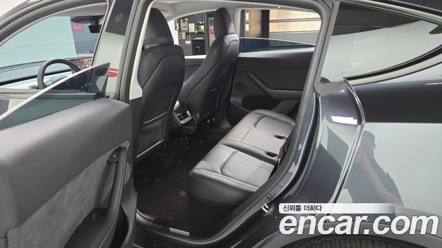 Tesla Model Y 2025 — photo 17