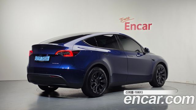Tesla Model Y 2022 — photo 2