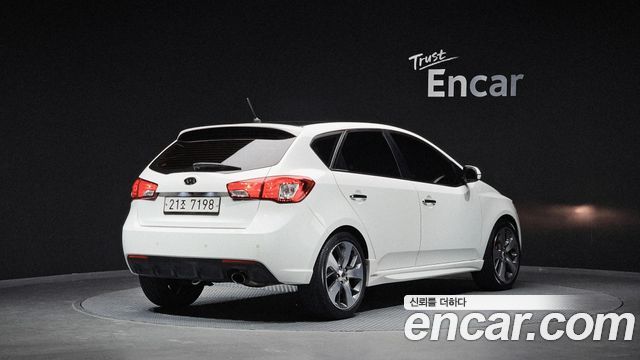 Kia Porte 2013 — photo 2
