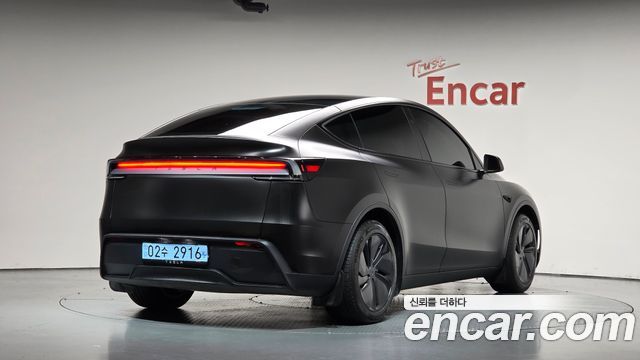 Tesla Model Y 2026 — photo 2