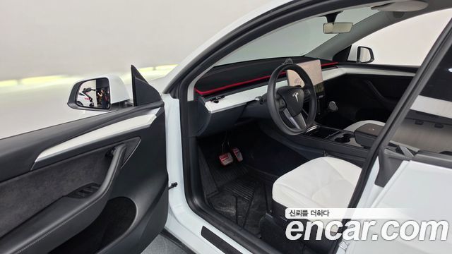 Tesla Model Y 2023 — photo 13