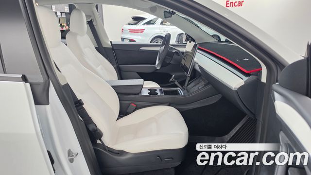 Tesla Model Y 2023 — photo 16