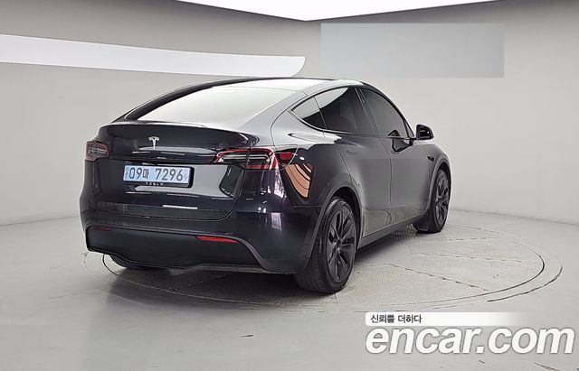 Tesla Model Y 2025 — photo 2