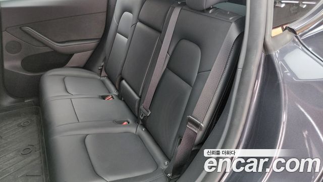 Tesla Model Y 2025 — photo 17