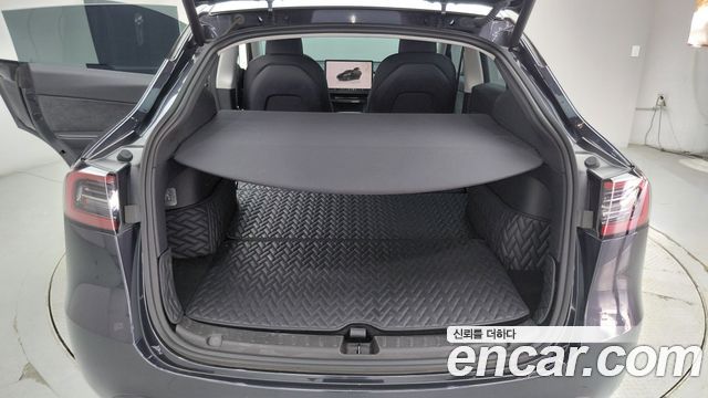 Tesla Model Y 2025 — photo 19