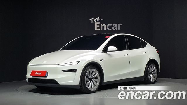 Tesla Model Y 2025 — photo 1