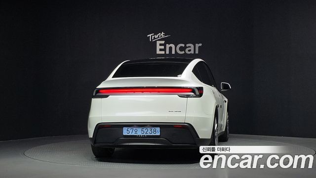 Tesla Model Y 2025 — photo 4