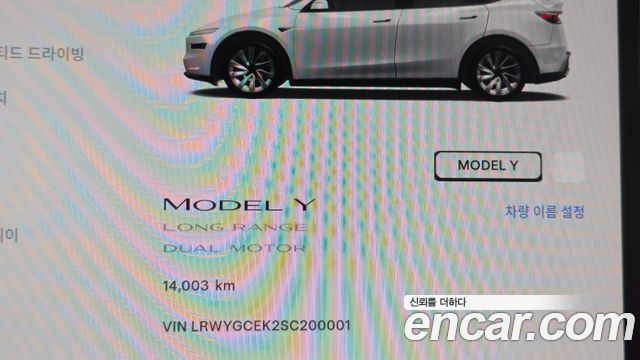 Tesla Model Y 2025 — photo 11