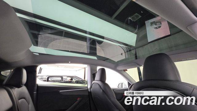 Tesla Model Y 2025 — photo 24