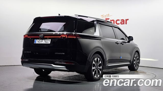 Kia Canival 2021 — photo 2