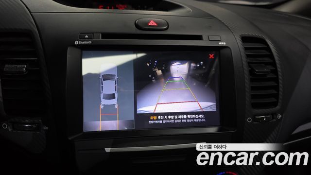 Kia K3 2014 — photo 16