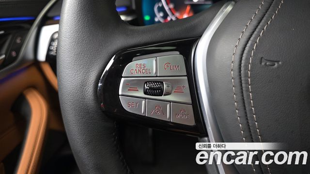 BMW 5-Series 2023 — photo 22