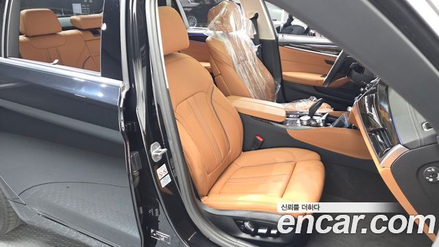 BMW 5-Series 2023 — photo 16