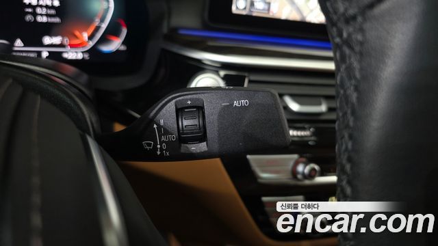 BMW 5-Series 2023 — photo 28