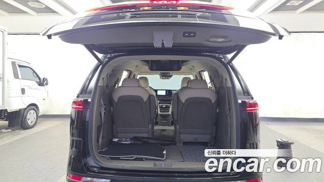 Kia Canival 2023 — photo 26