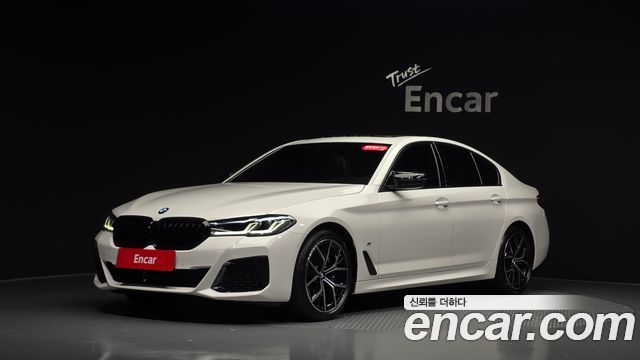 BMW 5-Series 2023 — photo 35