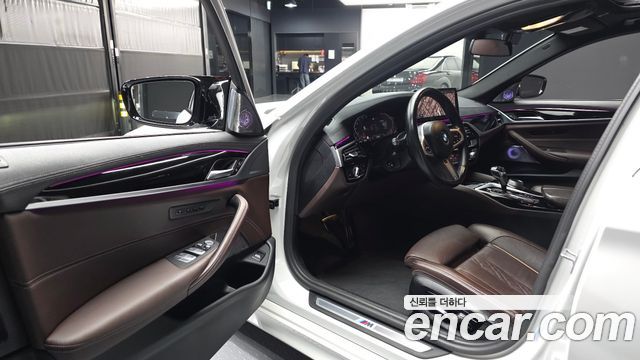 BMW 5-Series 2023 — photo 13