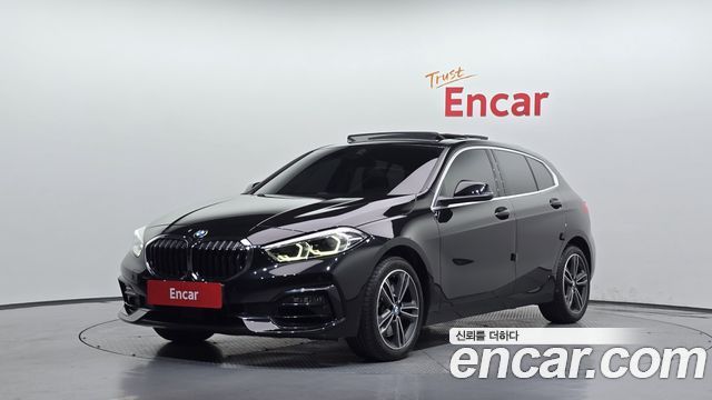 BMW 1-Series 2023 — photo 1