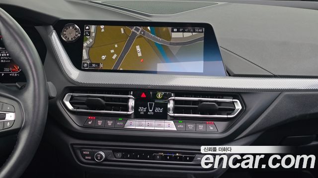 BMW 1-Series 2023 — photo 13