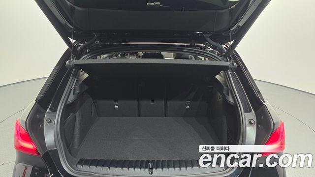 BMW 1-Series 2023 — photo 19