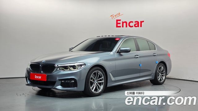 BMW 5-Series 2018 — photo 1