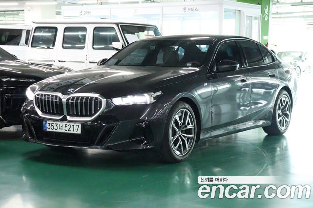 BMW 5-Series 2024 — photo 2