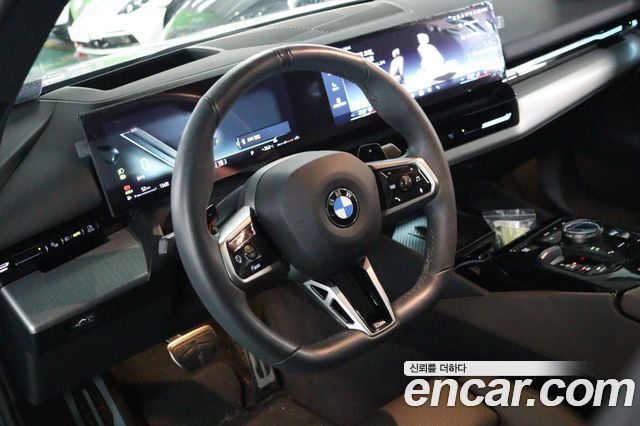 BMW 5-Series 2024 — photo 10