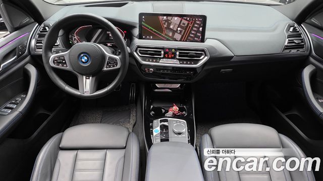 BMW iX3 2024 — photo 10